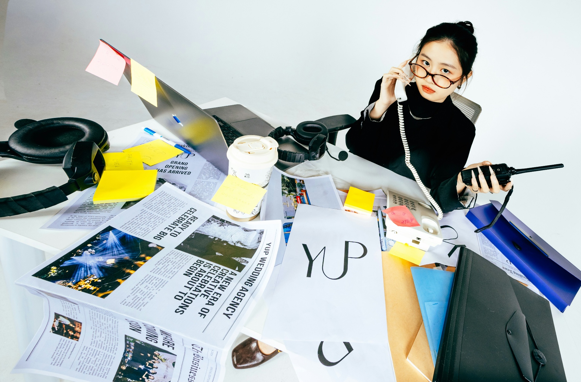 A candidate smiling during a job interview across a desk.